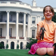 Alice plays with Cheney and Rumsfeld on the White House lawn.
